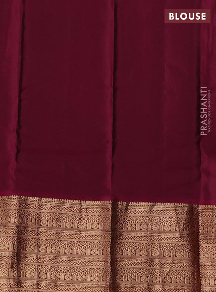 Kanchipuram silk saree peacock green and magenta pink with allover zari woven buttas and long zari woven border