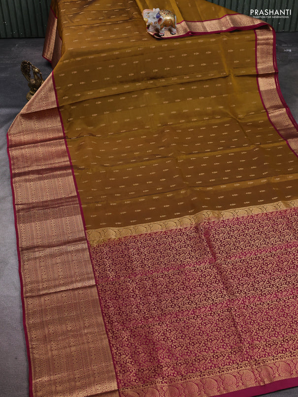Kanchipuram silk saree dark mustard and magenta pink with allover zari woven buttas and long zari woven border