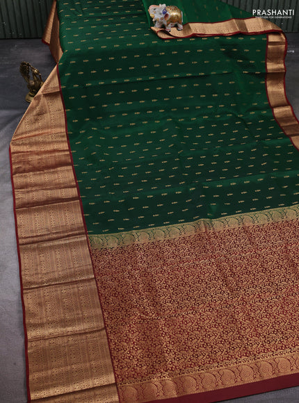 Kanchipuram silk saree green and maroon with allover zari woven buttas and long zari woven border