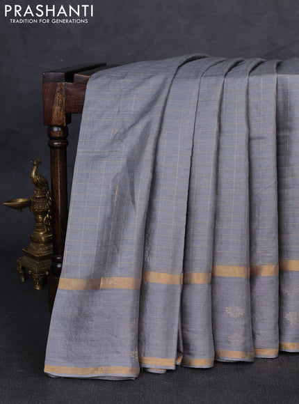 Banana silk saree grey with allover zari woven checked pattern and zari woven butta border
