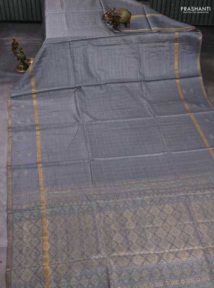 Banana silk saree grey with allover zari woven checked pattern and zari woven butta border