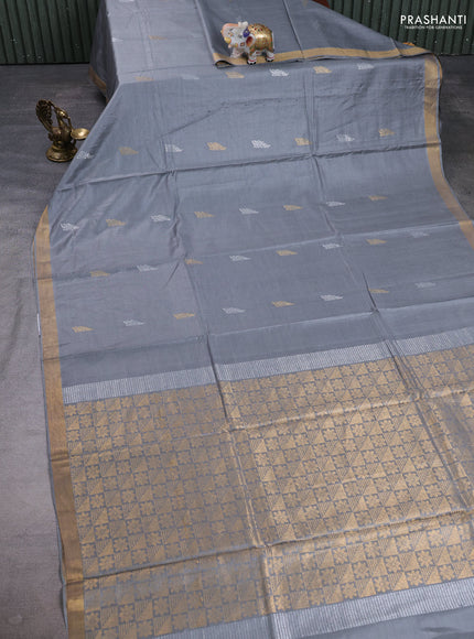 Banana silk saree grey with allover silver & gold zari woven buttas and zari woven border