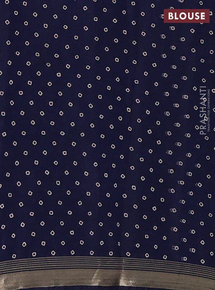 Muslin cotton saree navy blue with allover ajrakh prints and zari woven border