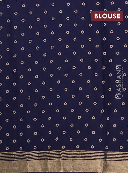 Muslin cotton saree navy blue with allover ajrakh prints and zari woven border