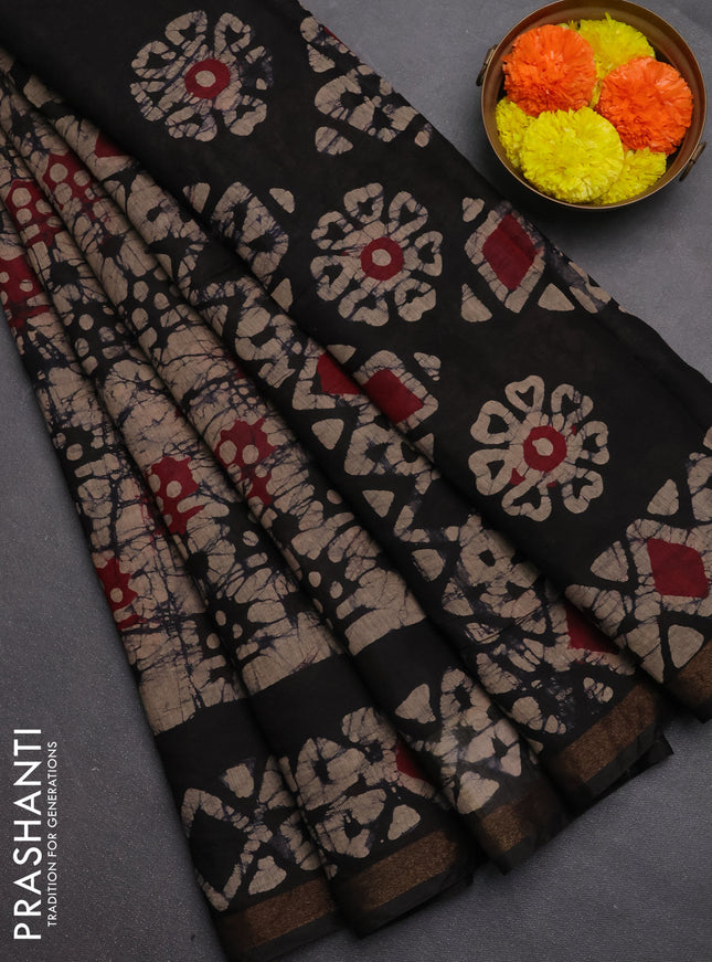 Muslin cotton saree jamun shade with allover batik prints and zari woven border