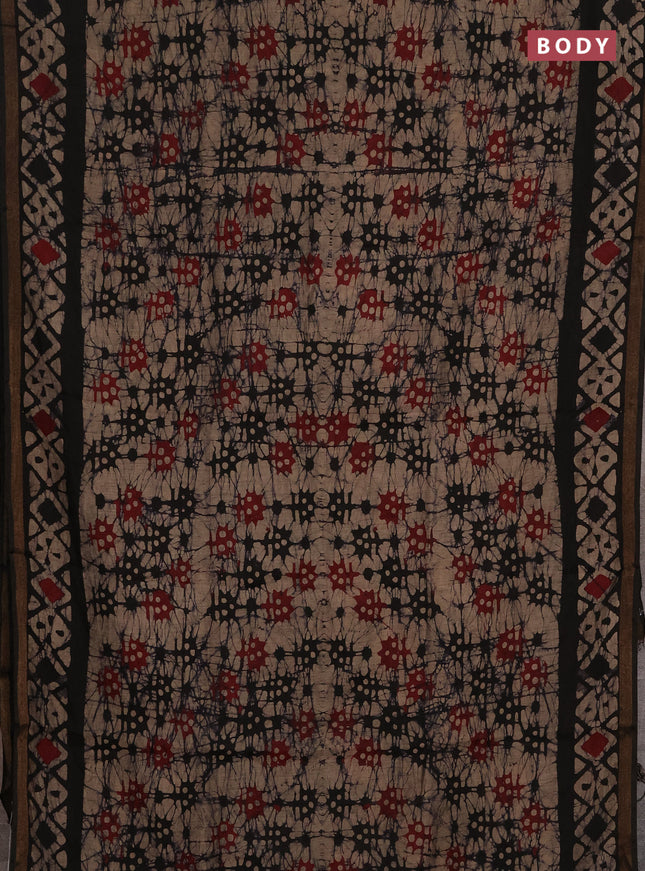 Muslin cotton saree jamun shade with allover batik prints and zari woven border