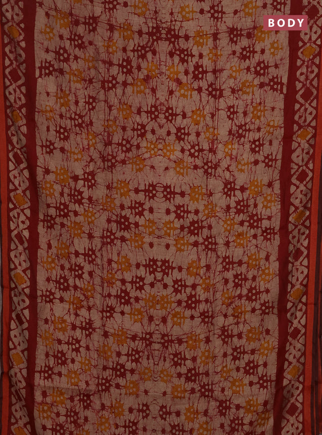 Muslin cotton saree maroon with allover batik prints and zari woven border