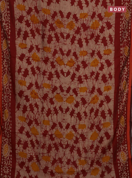 Muslin cotton saree maroon with allover batik prints and zari woven border