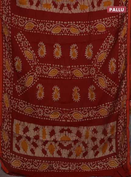 Muslin cotton saree maroon with allover batik prints and zari woven border