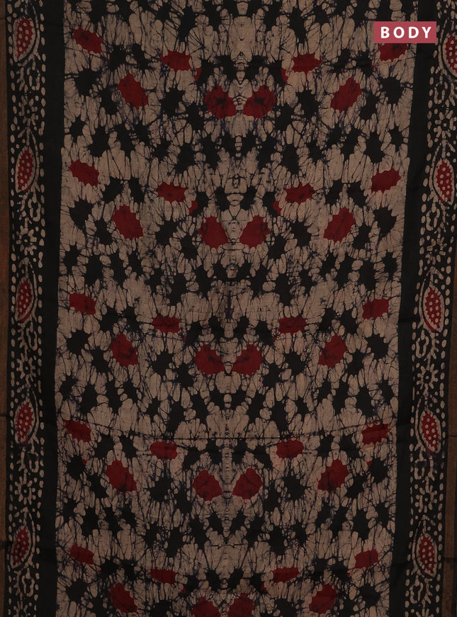 Muslin cotton saree black with allover batik prints and zari woven border