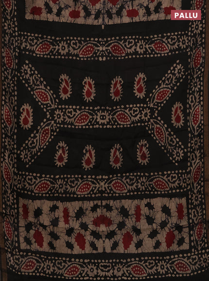 Muslin cotton saree black with allover batik prints and zari woven border