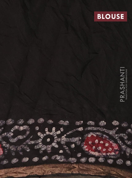 Muslin cotton saree black with allover batik prints and zari woven border