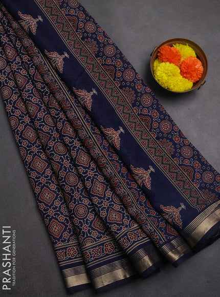 Muslin cotton saree navy blue with allover ajrakh prints and zari woven border