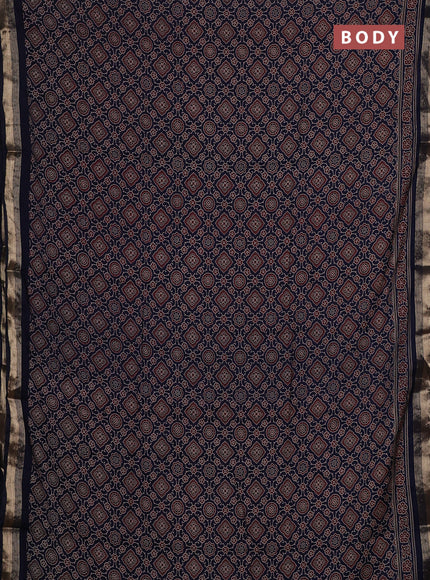 Muslin cotton saree navy blue with allover ajrakh prints and zari woven border