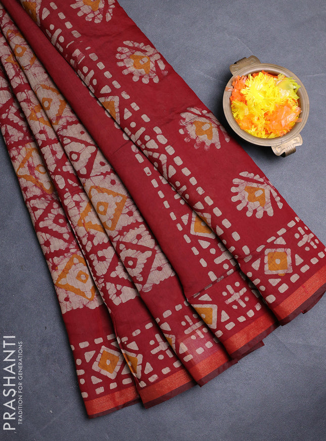 Muslin cotton saree maroon with allover batik prints and zari woven border