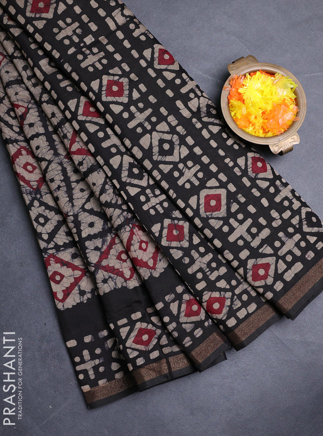 Muslin cotton saree jamun shade and black with allover batik prints and zari woven border