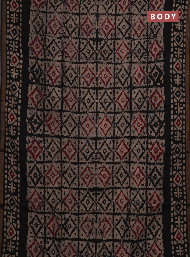 Muslin cotton saree jamun shade and black with allover batik prints and zari woven border