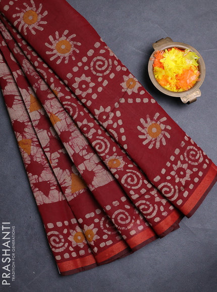Muslin cotton saree maroon with allover batik prints and zari woven border