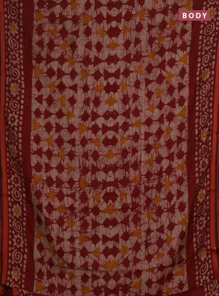 Muslin cotton saree maroon with allover batik prints and zari woven border