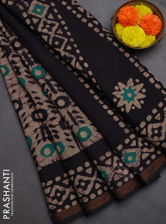 Muslin cotton saree wine shade with allover batik prints and zari woven border