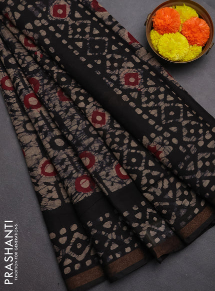 Muslin cotton saree jamun shade with allover batik prints and zari woven border
