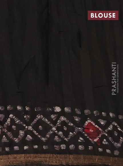 Muslin cotton saree jamun shade with allover batik prints and zari woven border