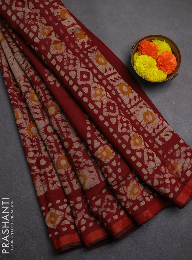 Muslin cotton saree wine shade with allover batik prints and printed border