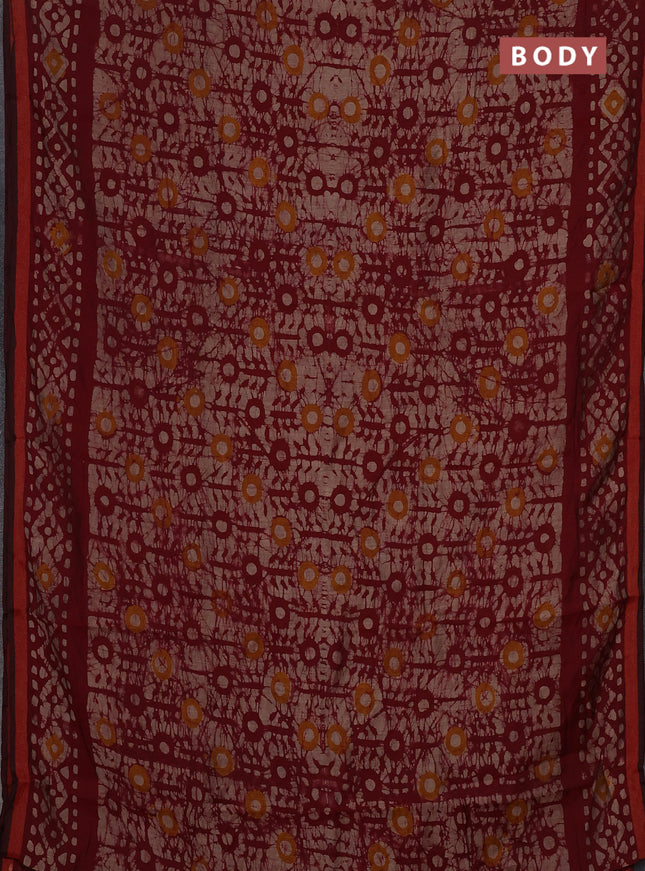 Muslin cotton saree wine shade with allover batik prints and printed border