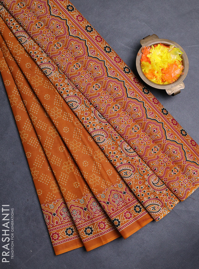 Muslin cotton saree dark mustard with allover bandhani prints and printed border
