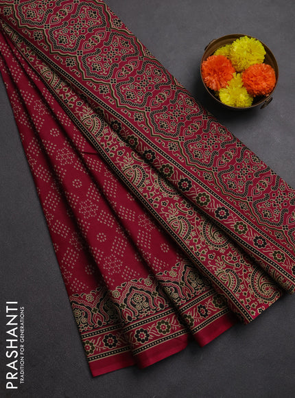 Muslin cotton saree wine shade with allover bandhani prints and printed border