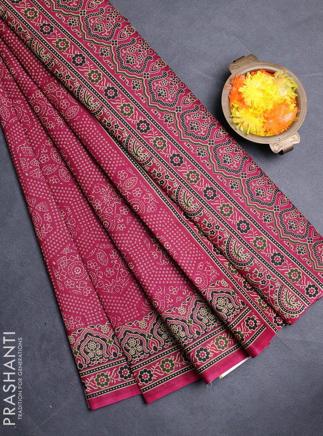 Muslin cotton saree wine shade with allover bandhani prints and printed border