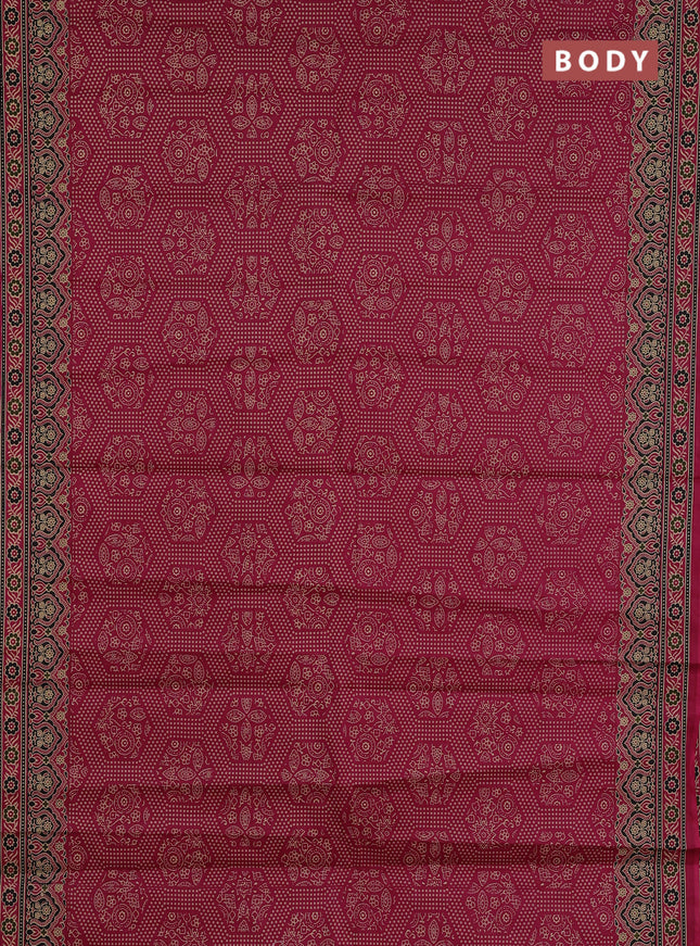 Muslin cotton saree wine shade with allover bandhani prints and printed border