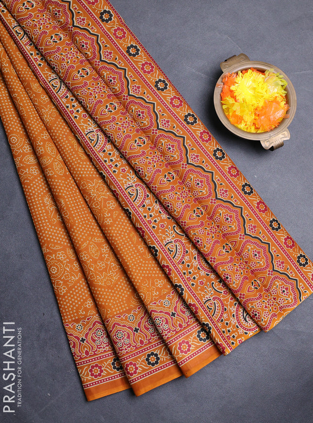 Muslin cotton saree dark mustard with allover bandhani prints and printed border