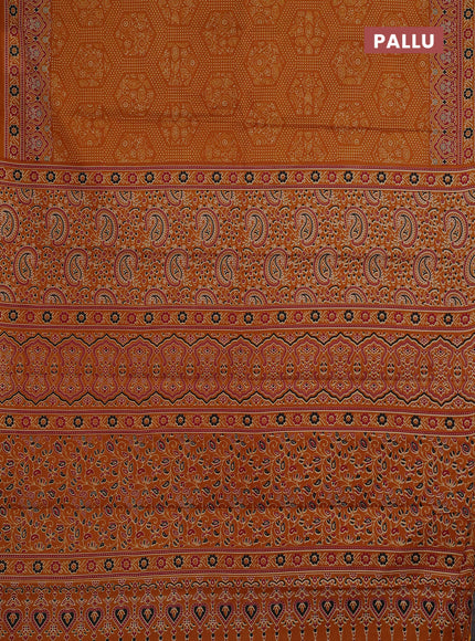 Muslin cotton saree dark mustard with allover bandhani prints and printed border