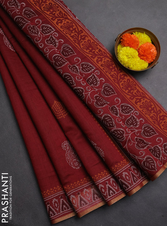 Muslin cotton saree maroon with allover black prints and printed border