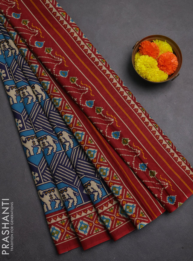 Muslin cotton saree blue and maroon with allover patola prints and printed border