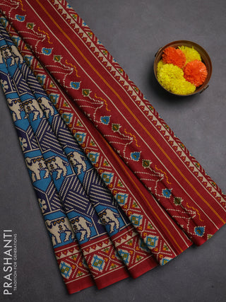 Muslin cotton saree blue and maroon with allover patola prints and printed border