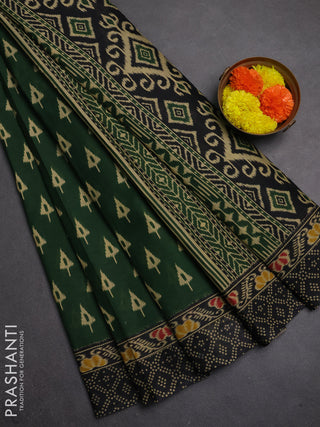 Muslin cotton saree green and black with allover ikat butta prints and printed border