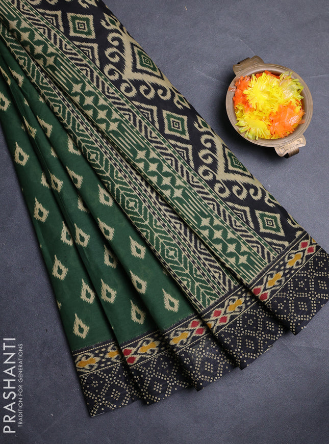 Muslin cotton saree green and black with allover ikat prints and printed border