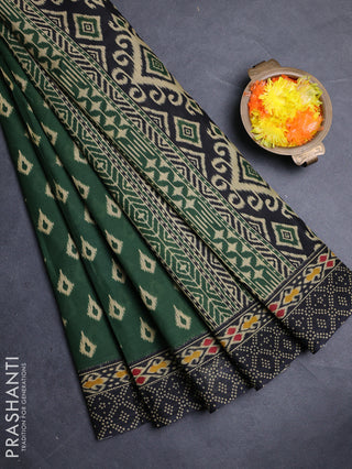 Muslin cotton saree green and black with allover ikat prints and printed border