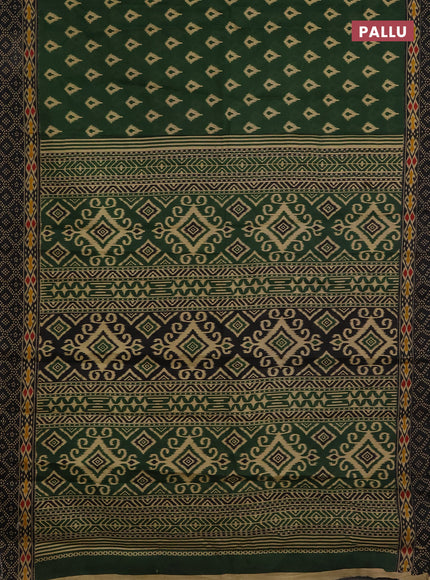 Muslin cotton saree green and black with allover ikat prints and printed border