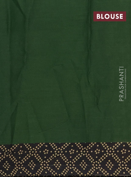 Muslin cotton saree green and black with allover ikat prints and printed border