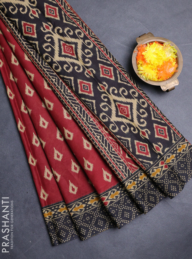 Muslin cotton saree maroon and black with allover ikat prints and printed border