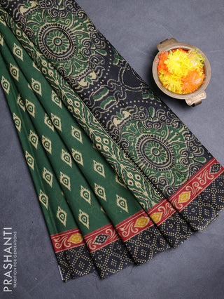 Muslin cotton saree green and black with allover ikat butta prints and printed border
