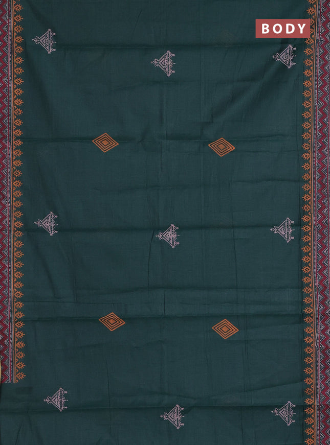 Muslin cotton saree peacock green with allover black prints and printed border
