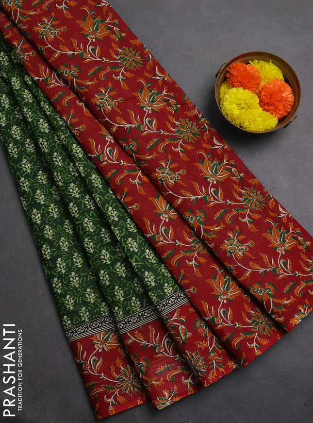 Muslin cotton saree green and maroon with allover dabu prints and printed border