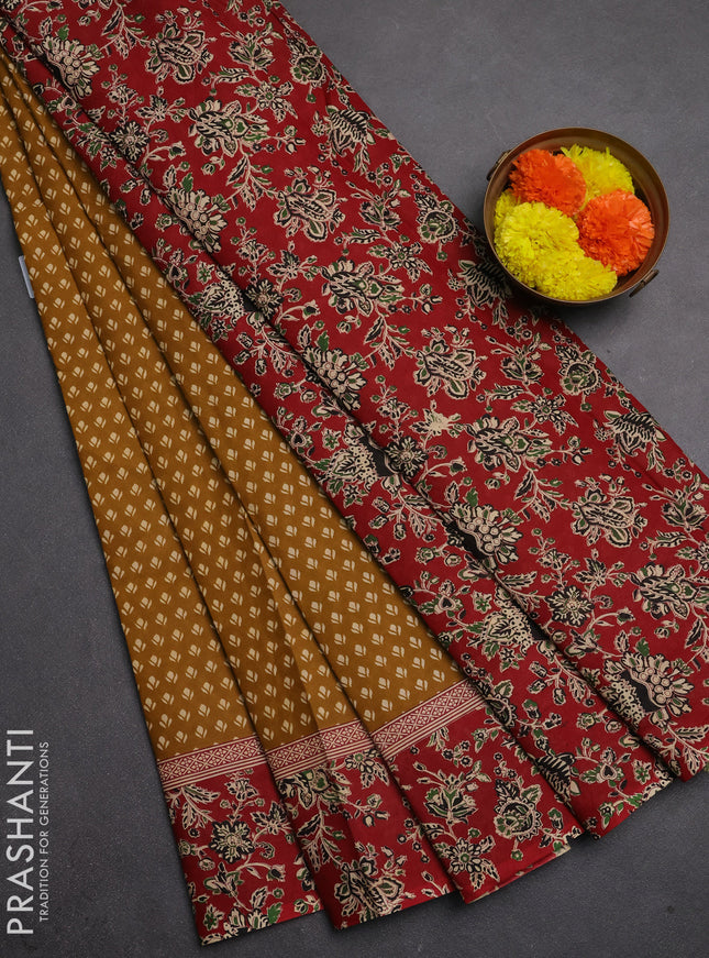 Muslin cotton saree dark mustard and maroon with allover butta prints and printed border