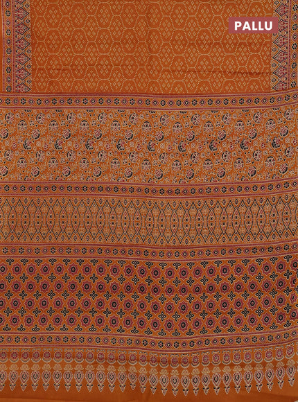 Muslin cotton saree dark mustard with allover bandhani prints and printed border