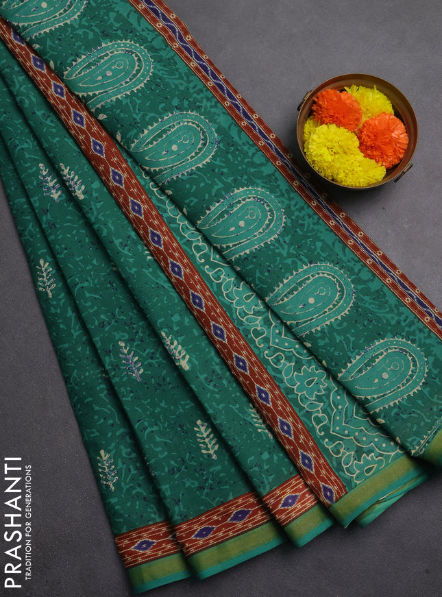 Muslin cotton saree green with allover dabu prints and printed border