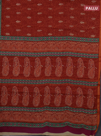 Muslin cotton saree rust shade with allover dabu prints and printed border
